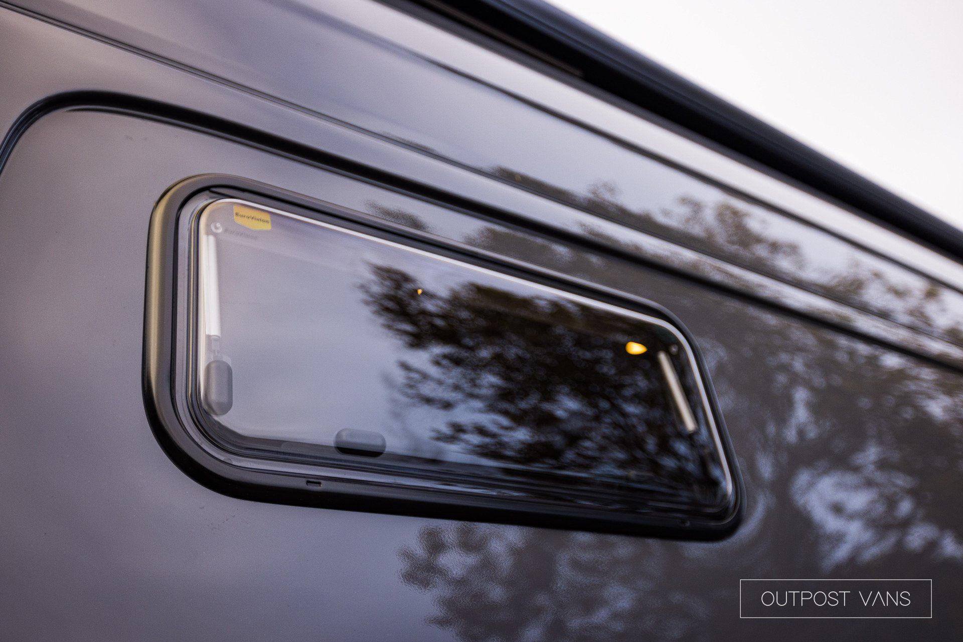 a close up of a window on the side of a vehicle .