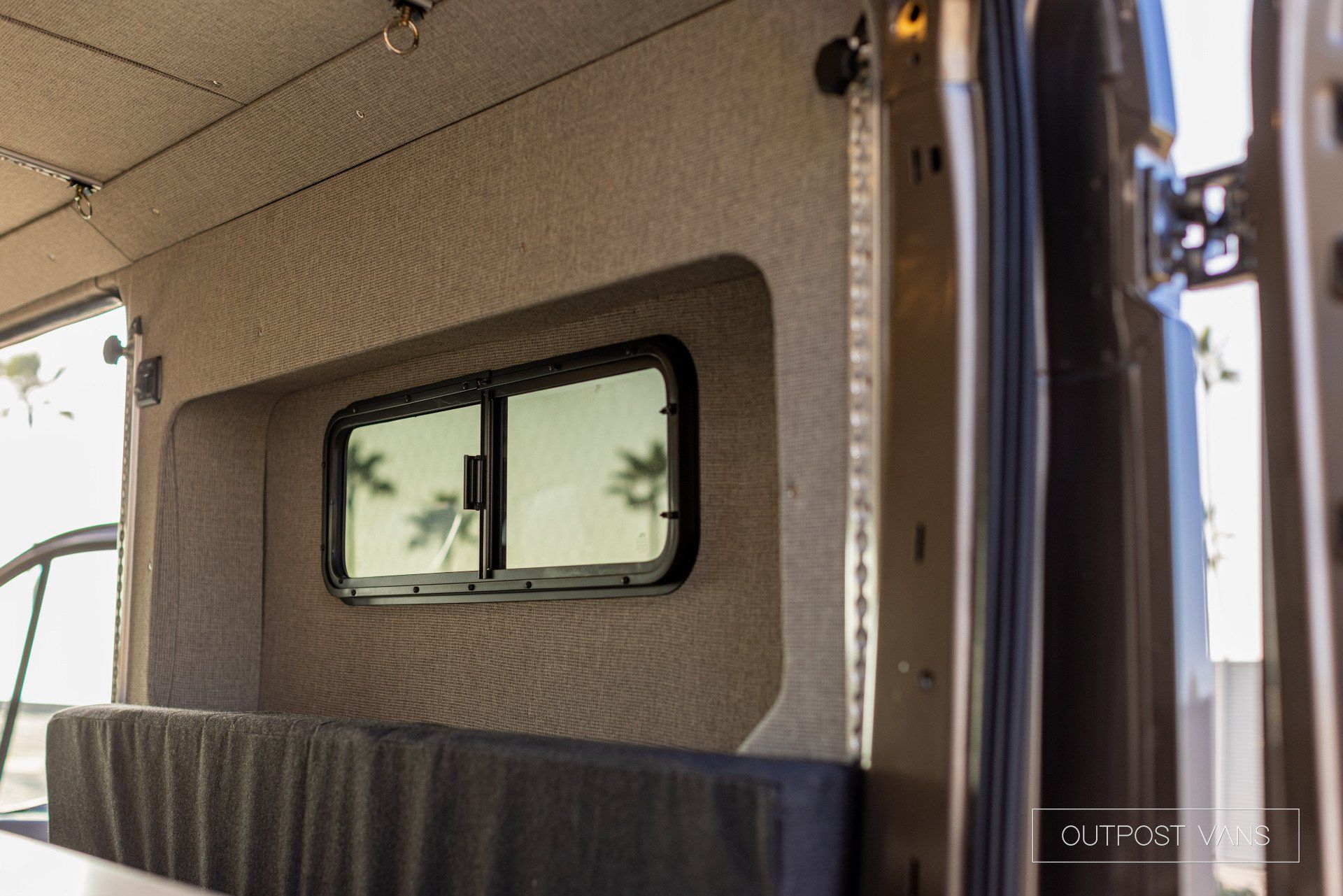 a van with two windows on the side of it .