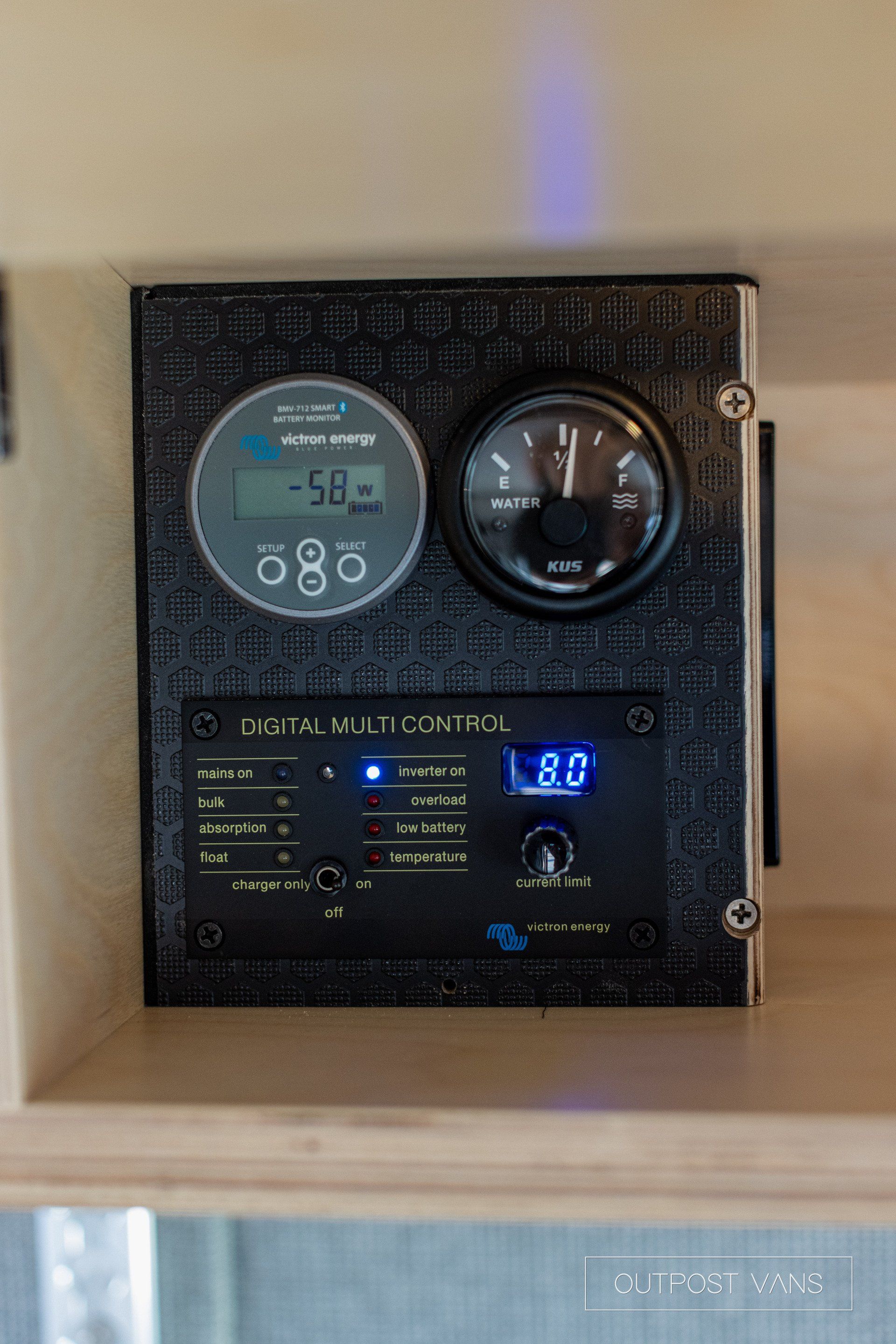 a close up of a dashboard with two gauges on it .
