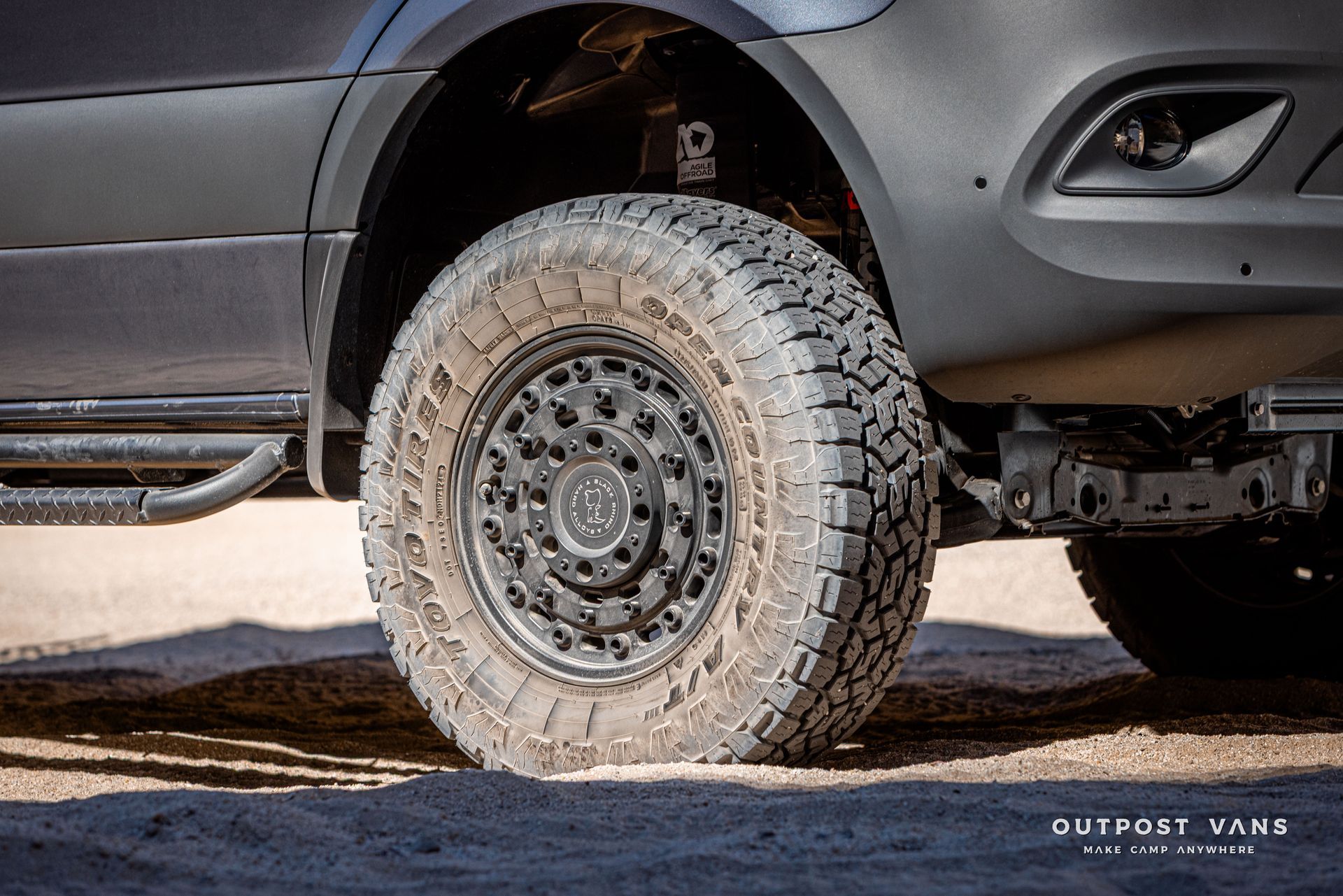 sprinter van with black Rhino Arsenal wheels and toyo open-country tires