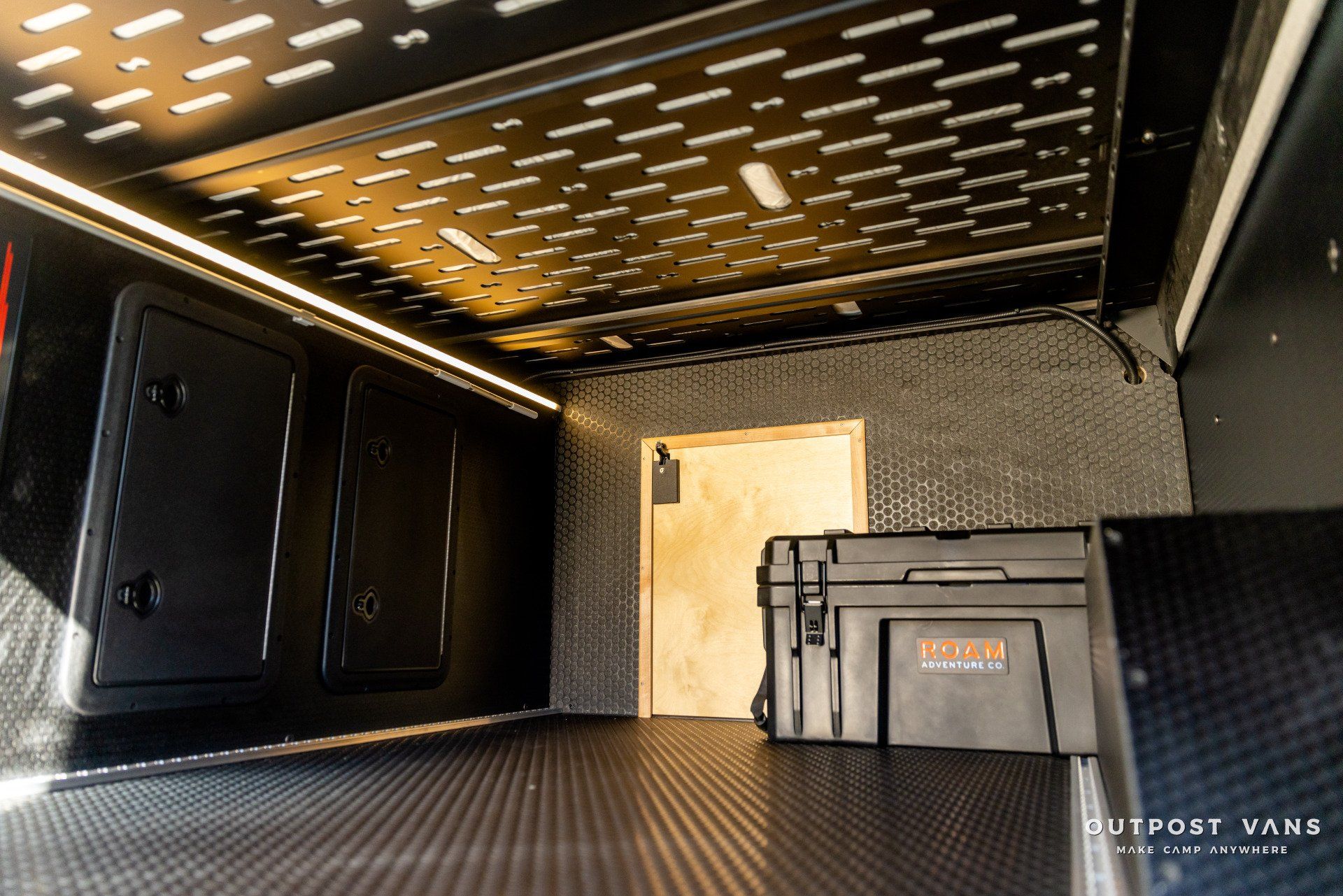 the inside of a van with a roof rack and a door .