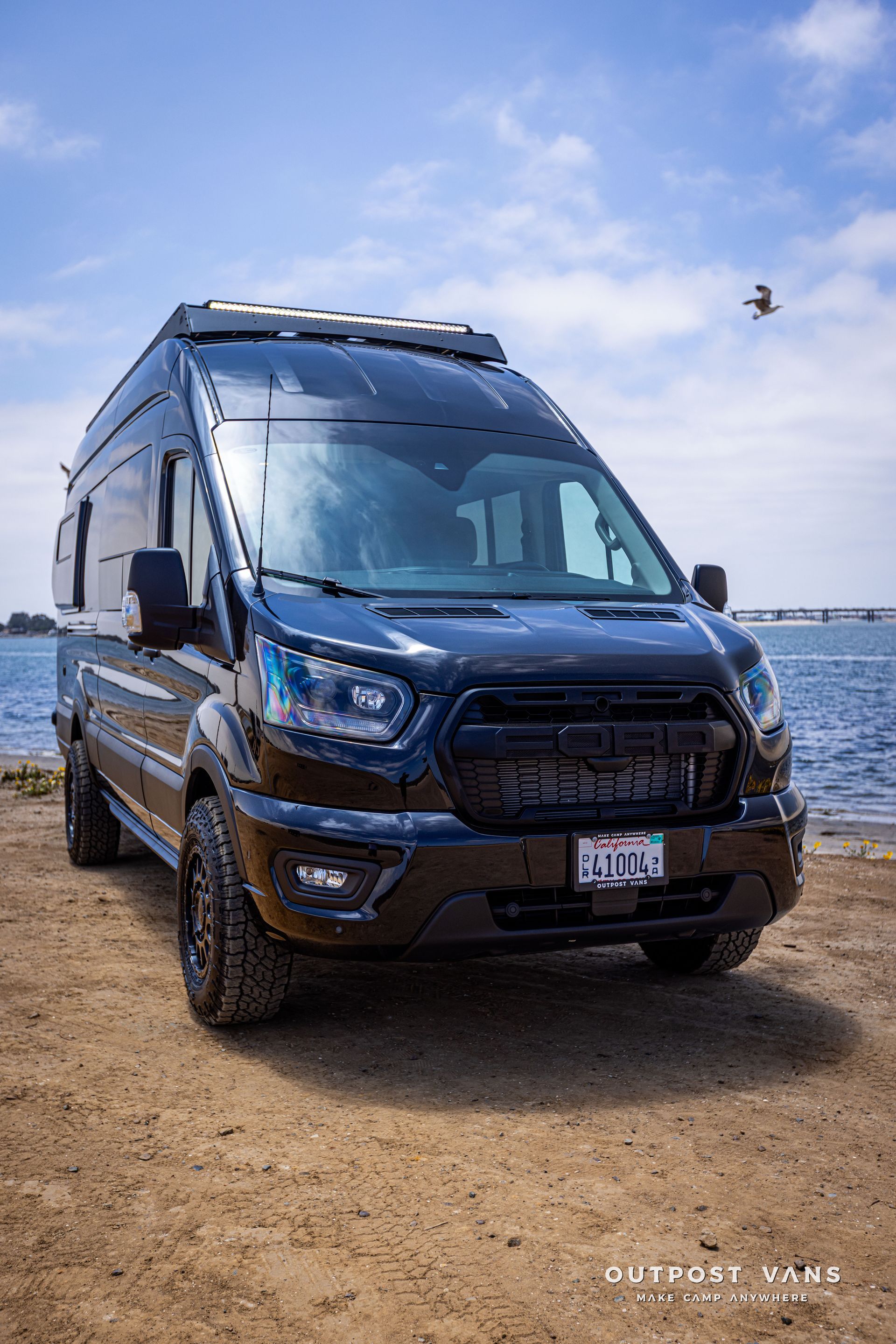 Outpost Vans custom built camper van Ford Transit 148 AWD