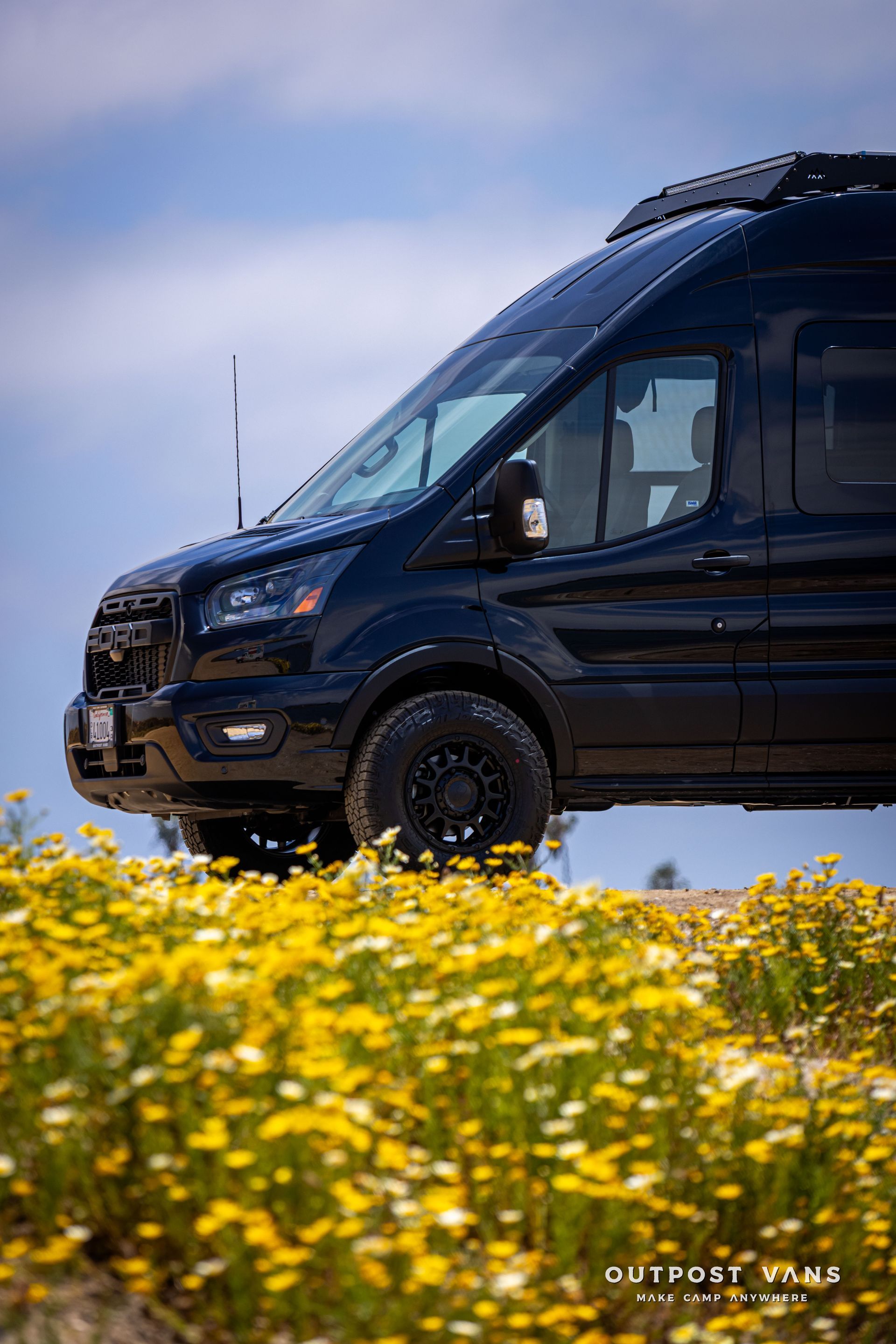 Outpost Vans custom built camper van Ford Transit 148 AWD