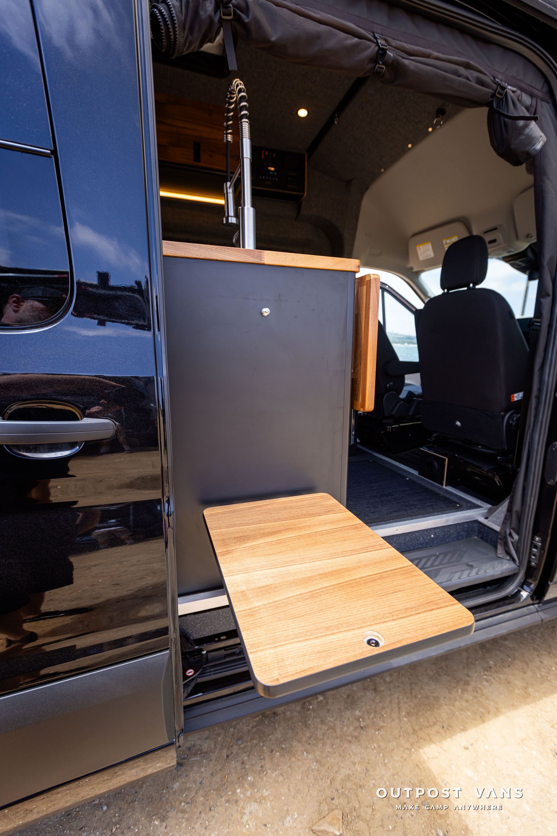 Outpost Vans custom built camper van Ford Transit 148 AWD.