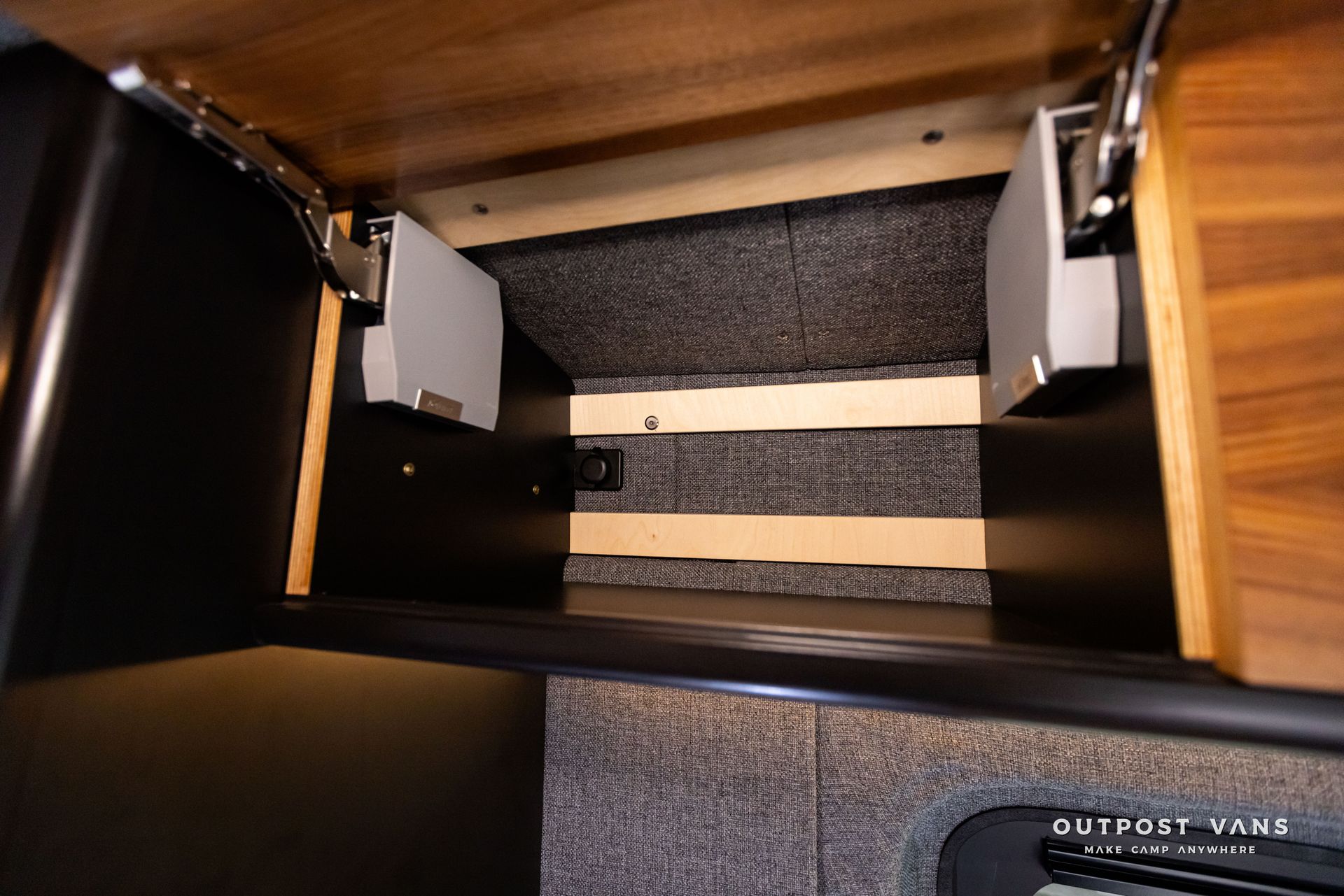 Outpost Vans custom built camper van Ford Transit 148 AWD. The inside of a cabinet.