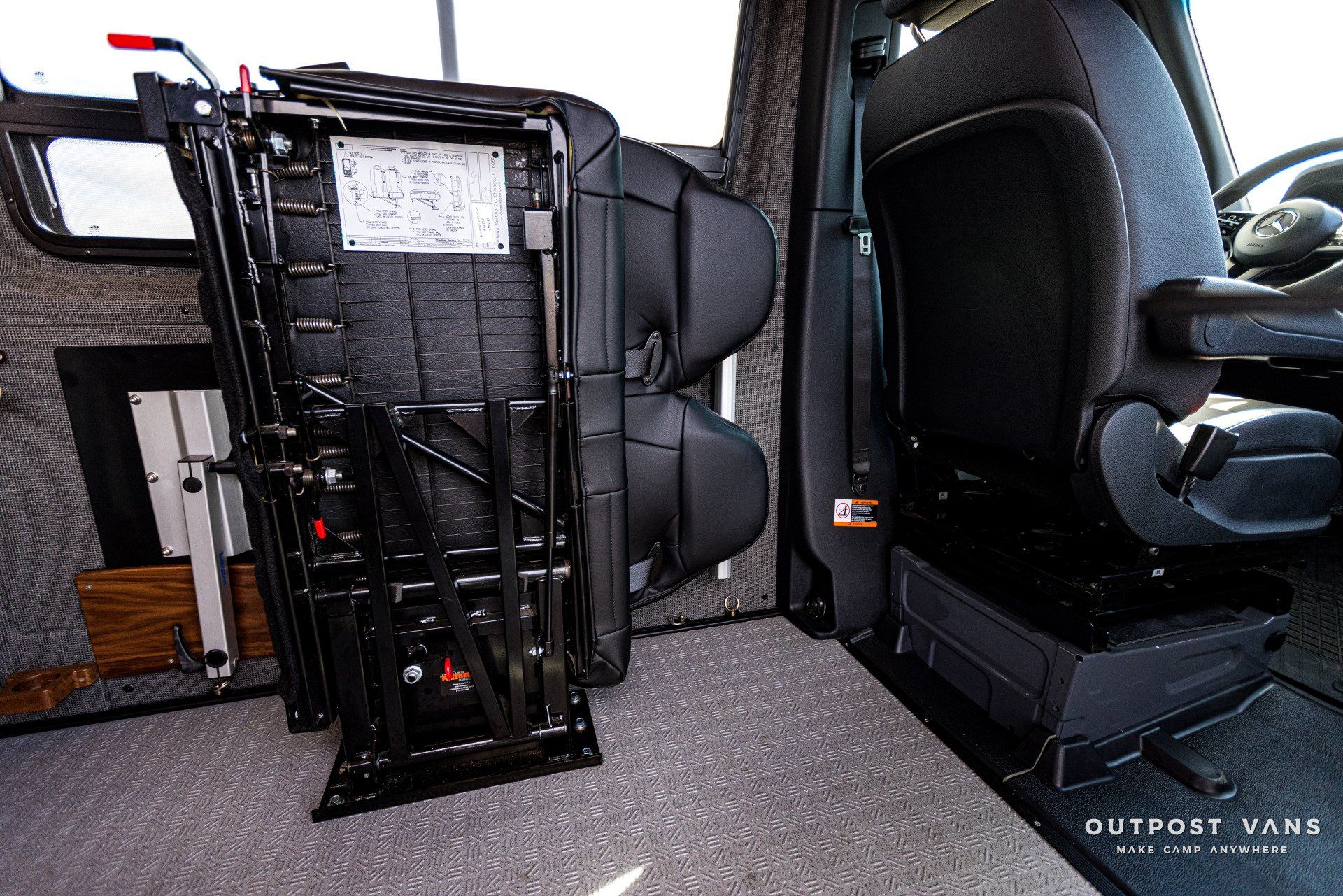 The back seat of a truck is empty and ready to be used.