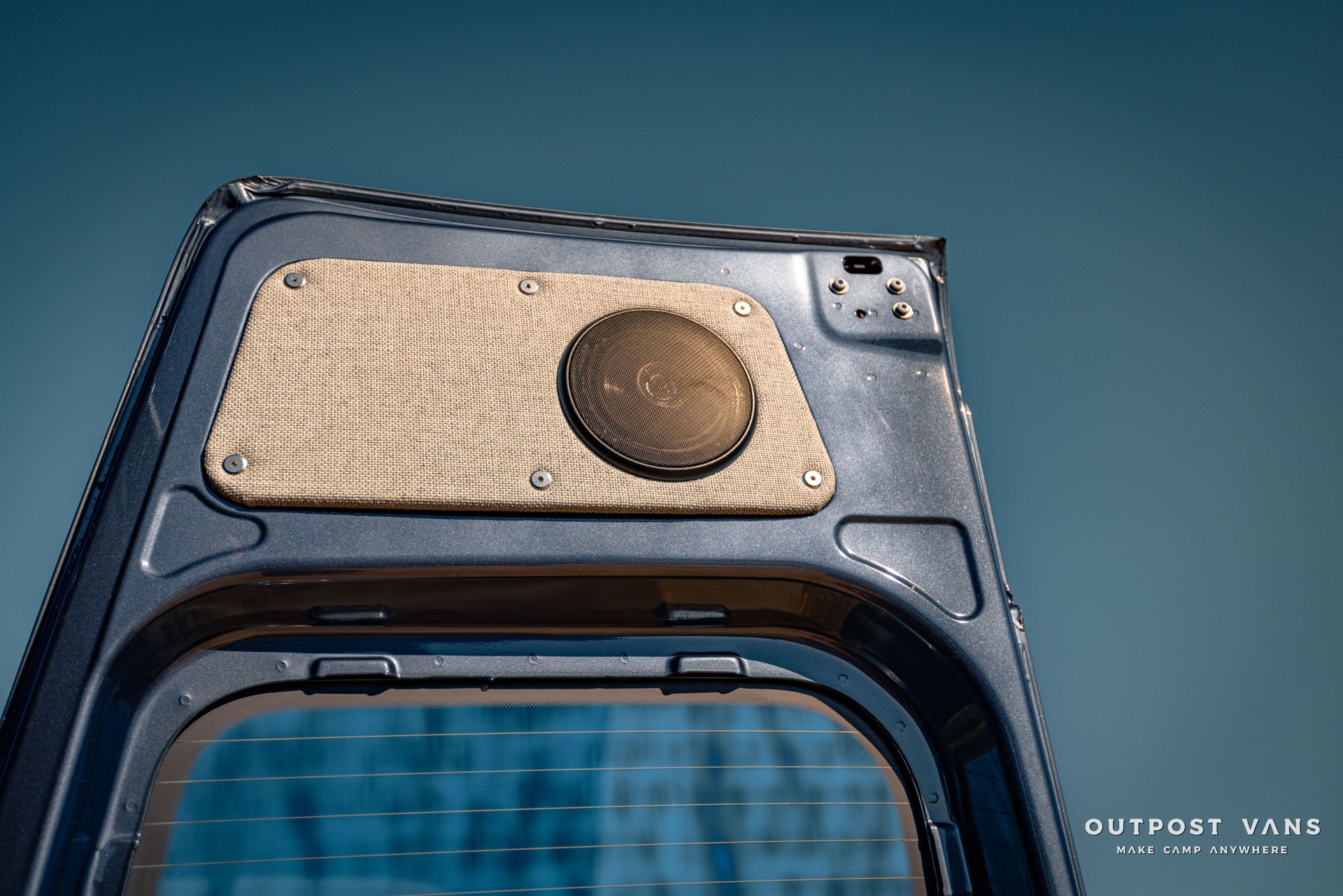 a close up of the back of a car with a speaker on it .