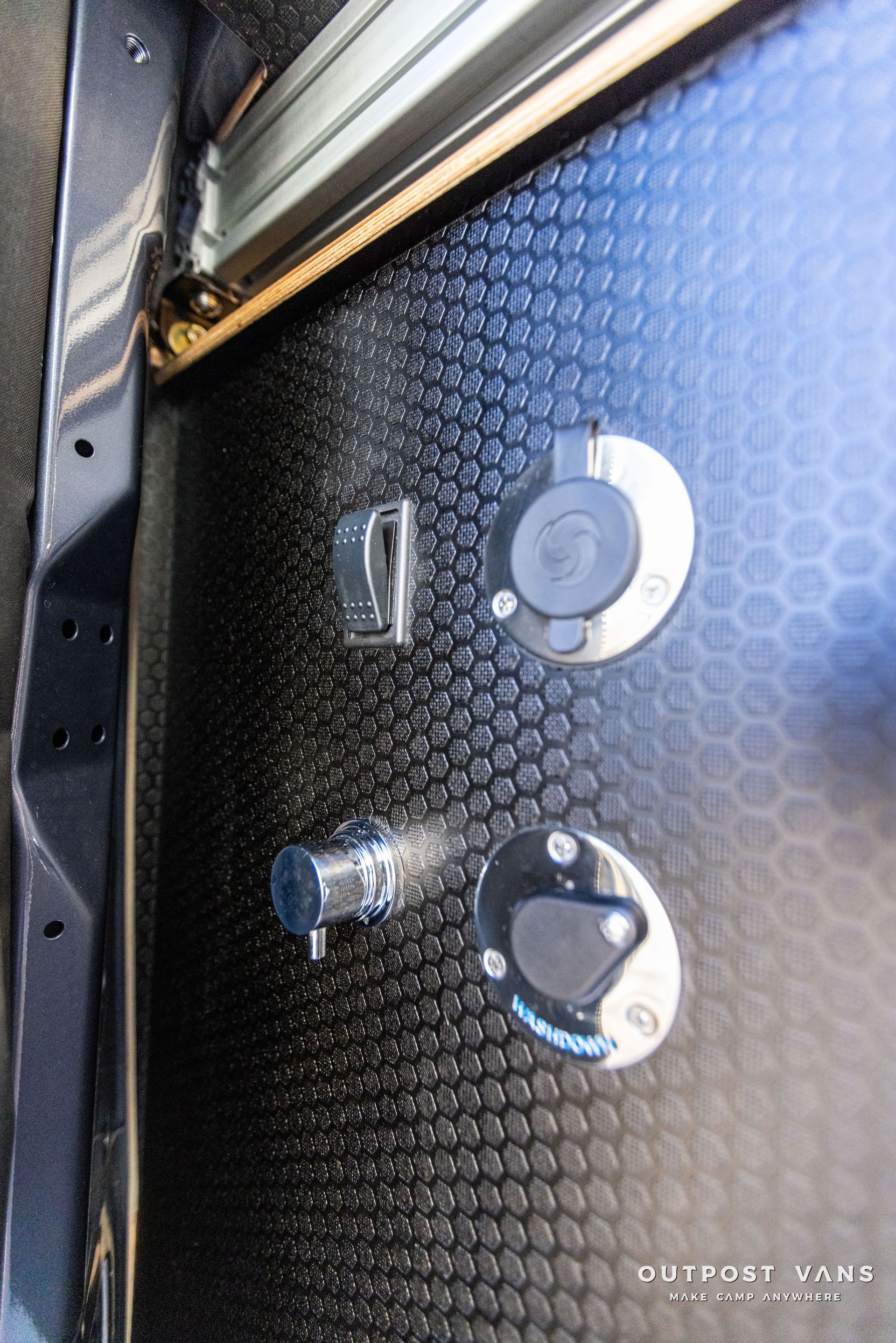 a close up of a door with a bunch of buttons on it