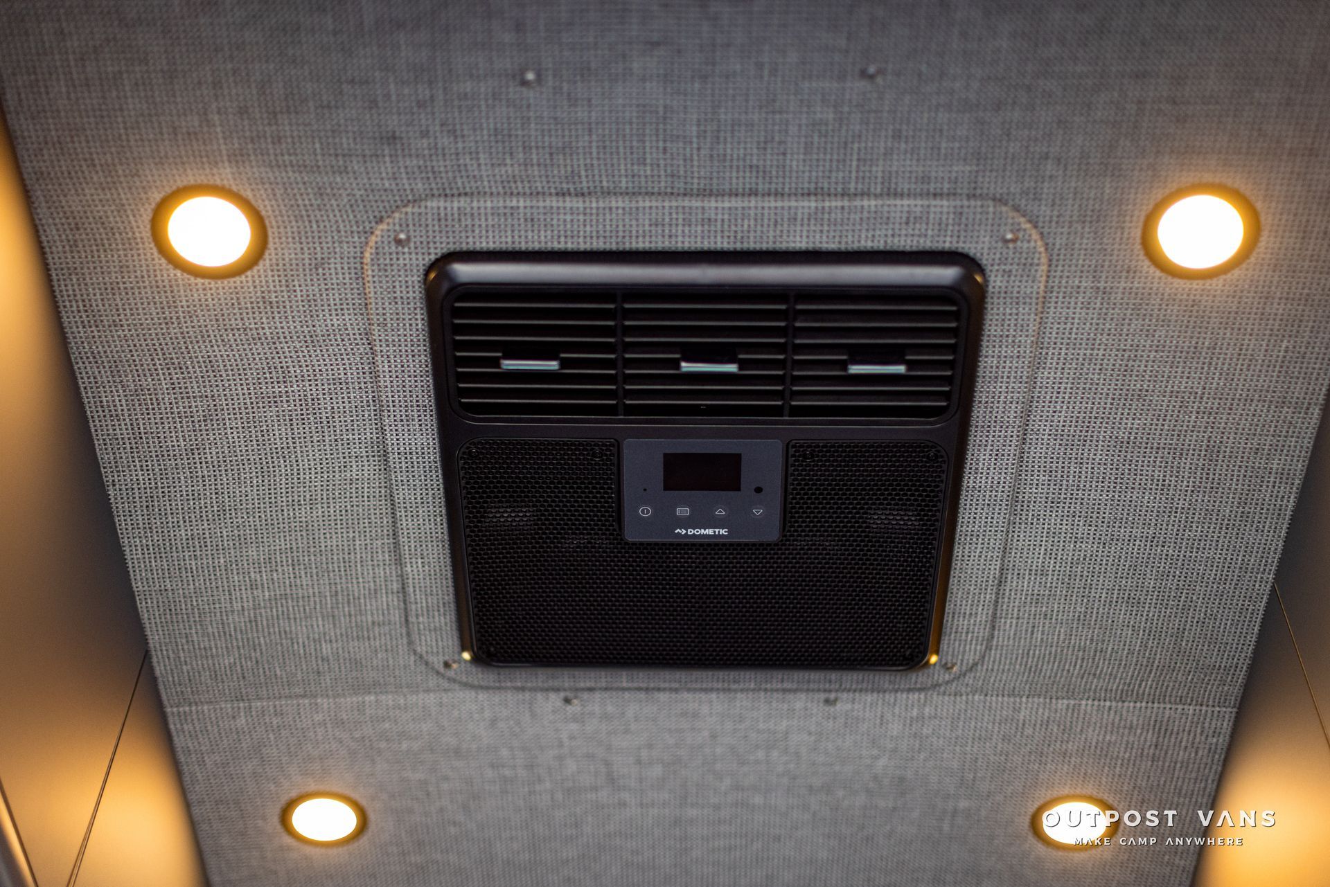 a ceiling fan is mounted to the ceiling of a van .