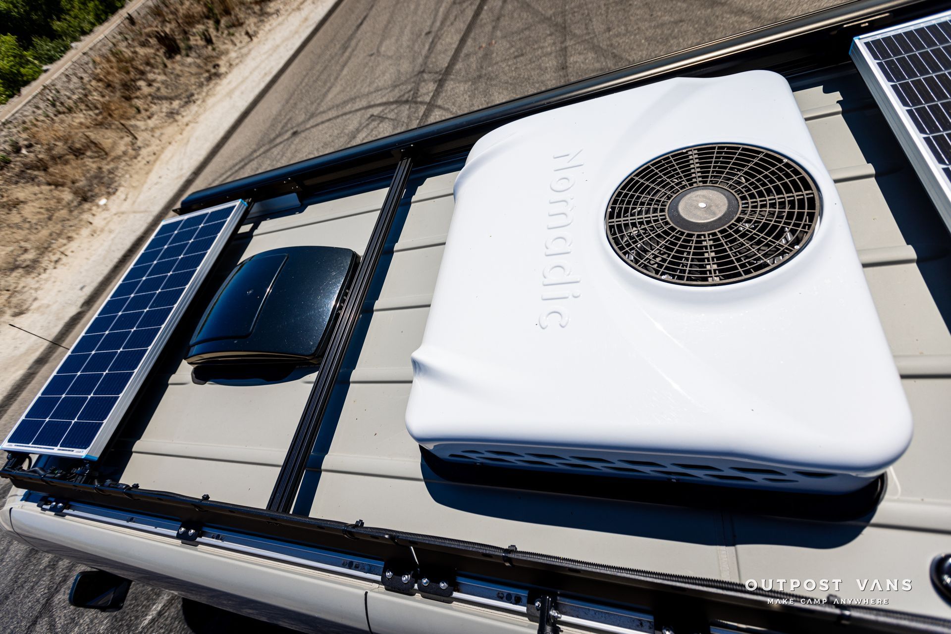 A rooftop air conditioner with solar panels on it