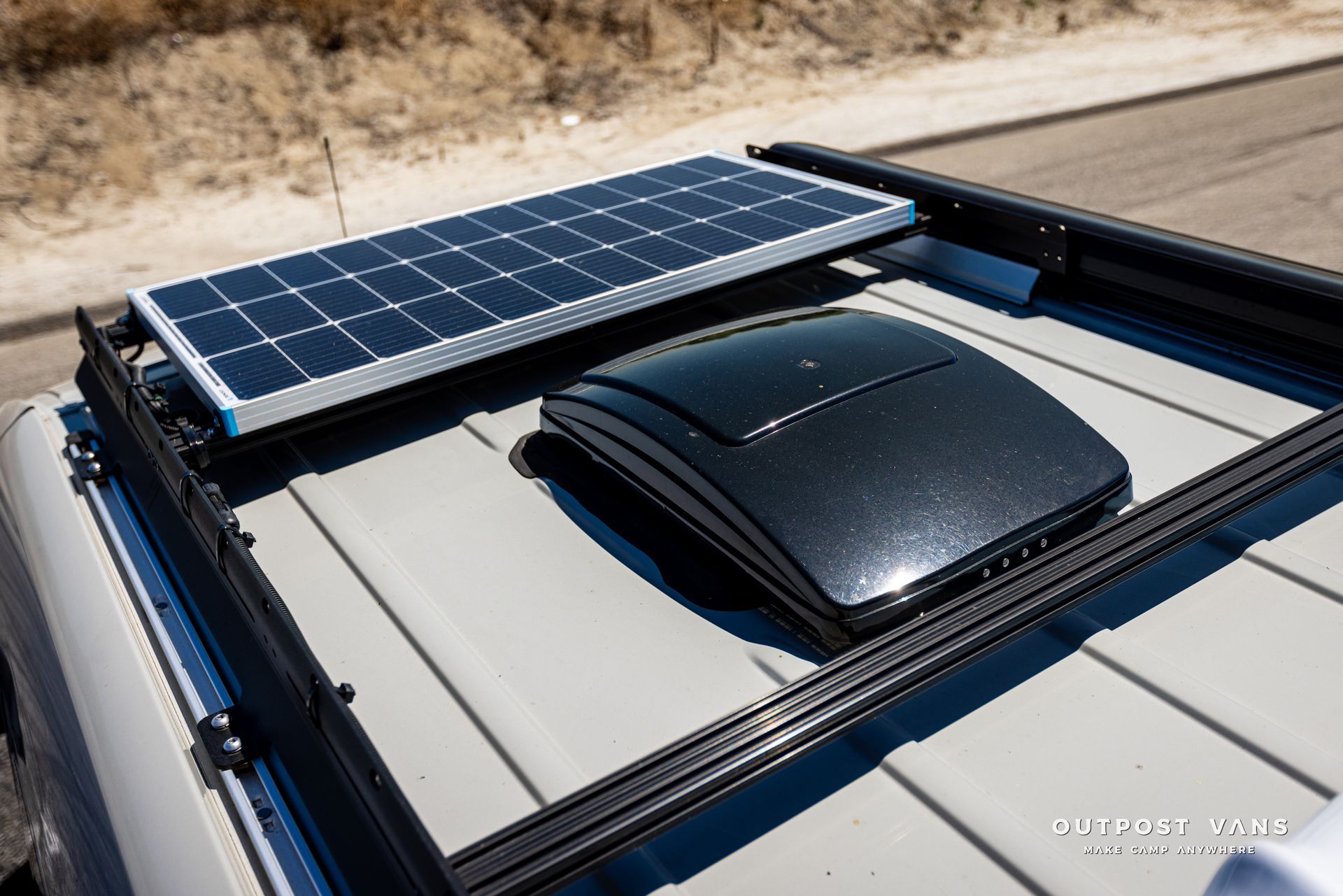 A solar panel is mounted on the roof of a vehicle.