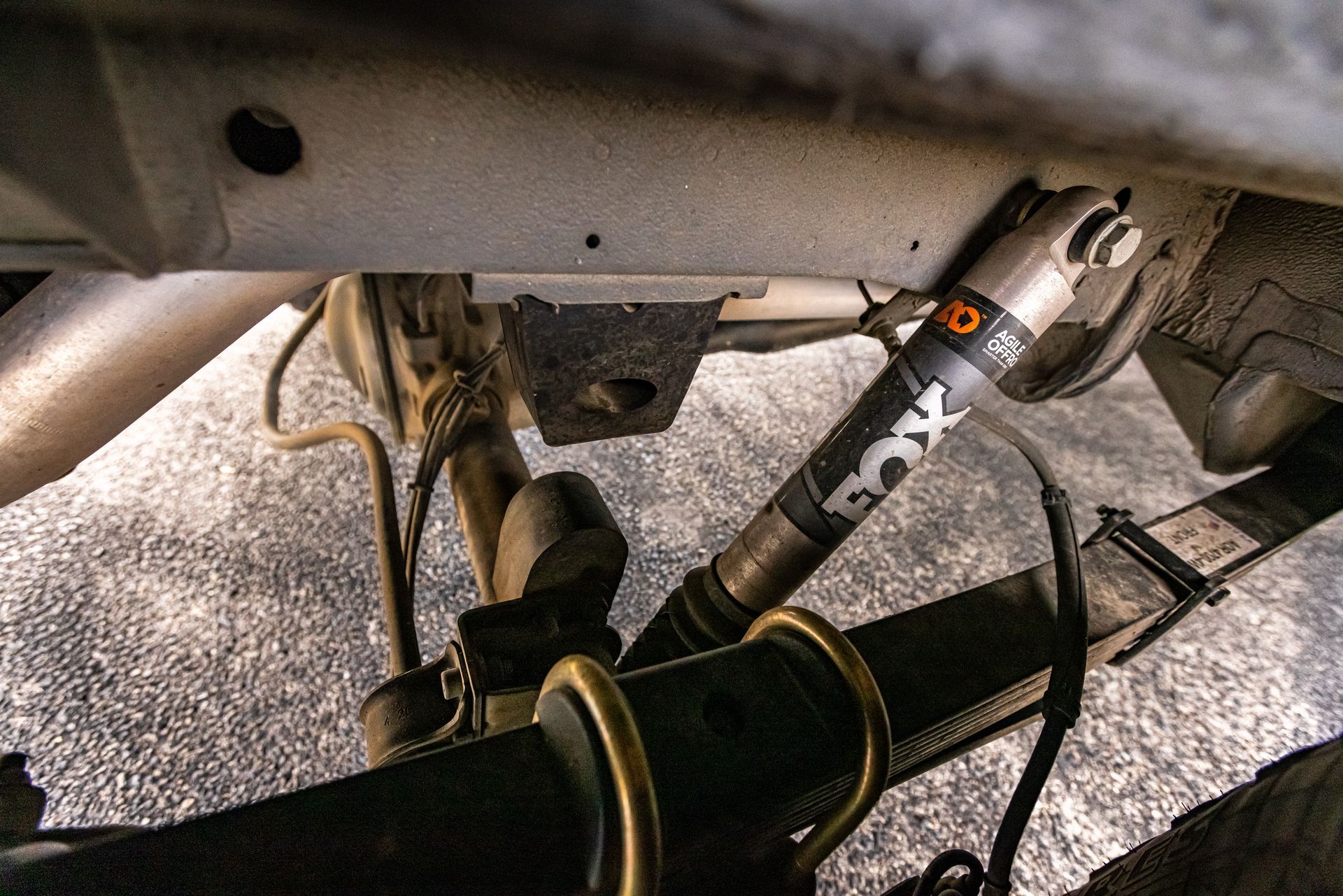 A close up of a fox shock on a truck