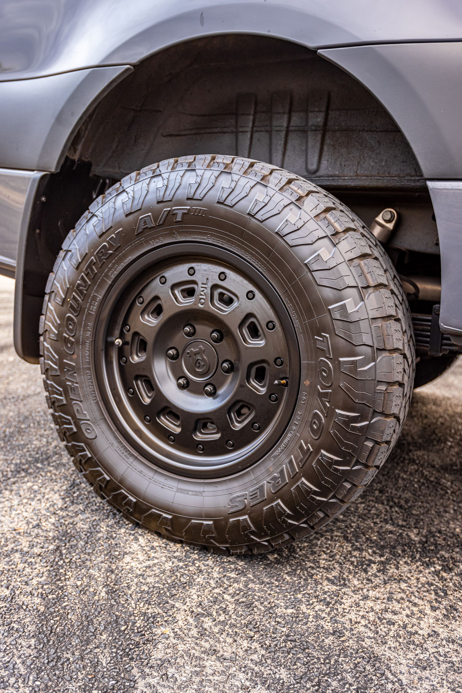 A close up of a tire on a car.