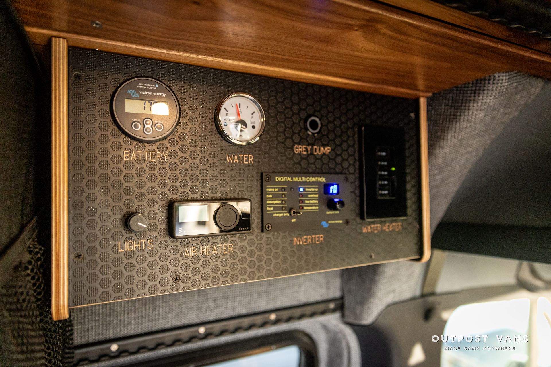 a close up of a dashboard in a vehicle with a clock on it .
