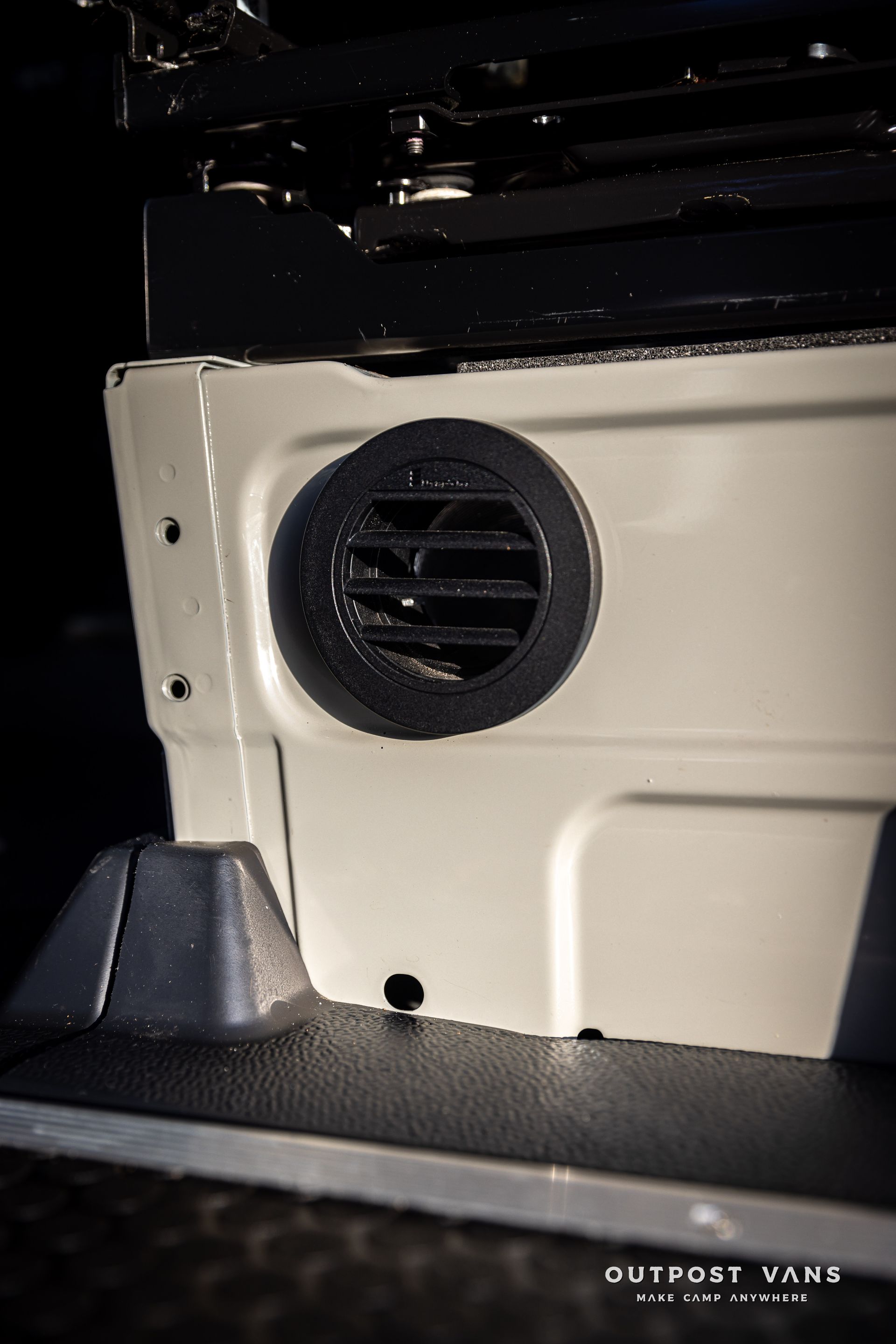a close up of a vent on the side of a vehicle .