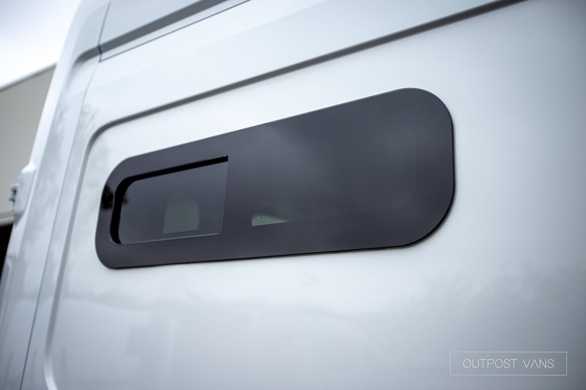 a close up of a window on the side of a van .