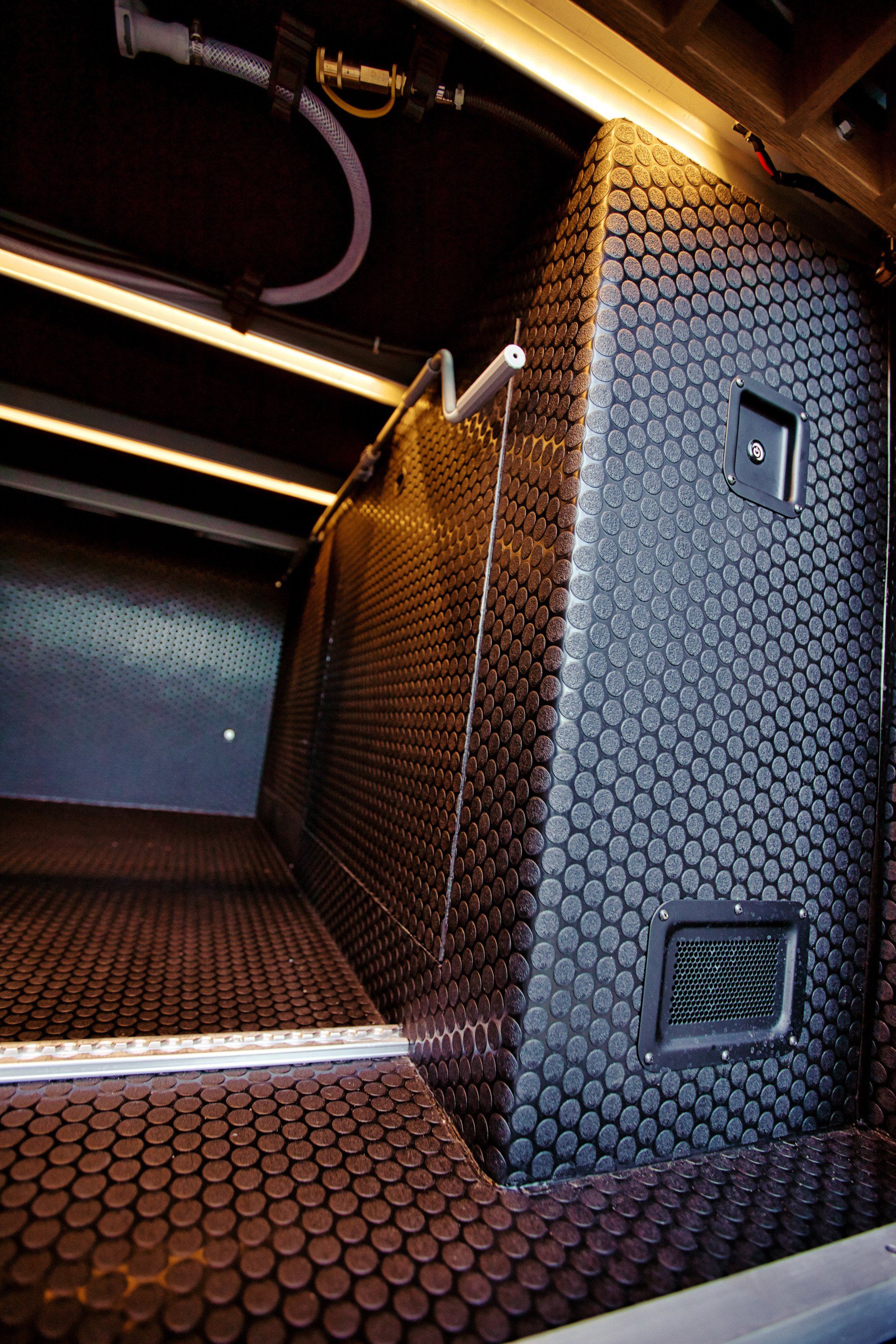 A dark room with a lot of holes in it