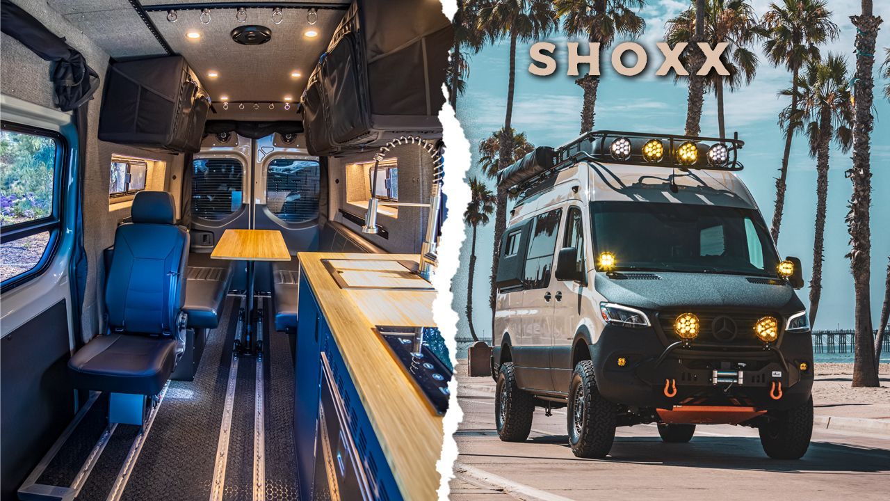 A van is parked next to a camper van.