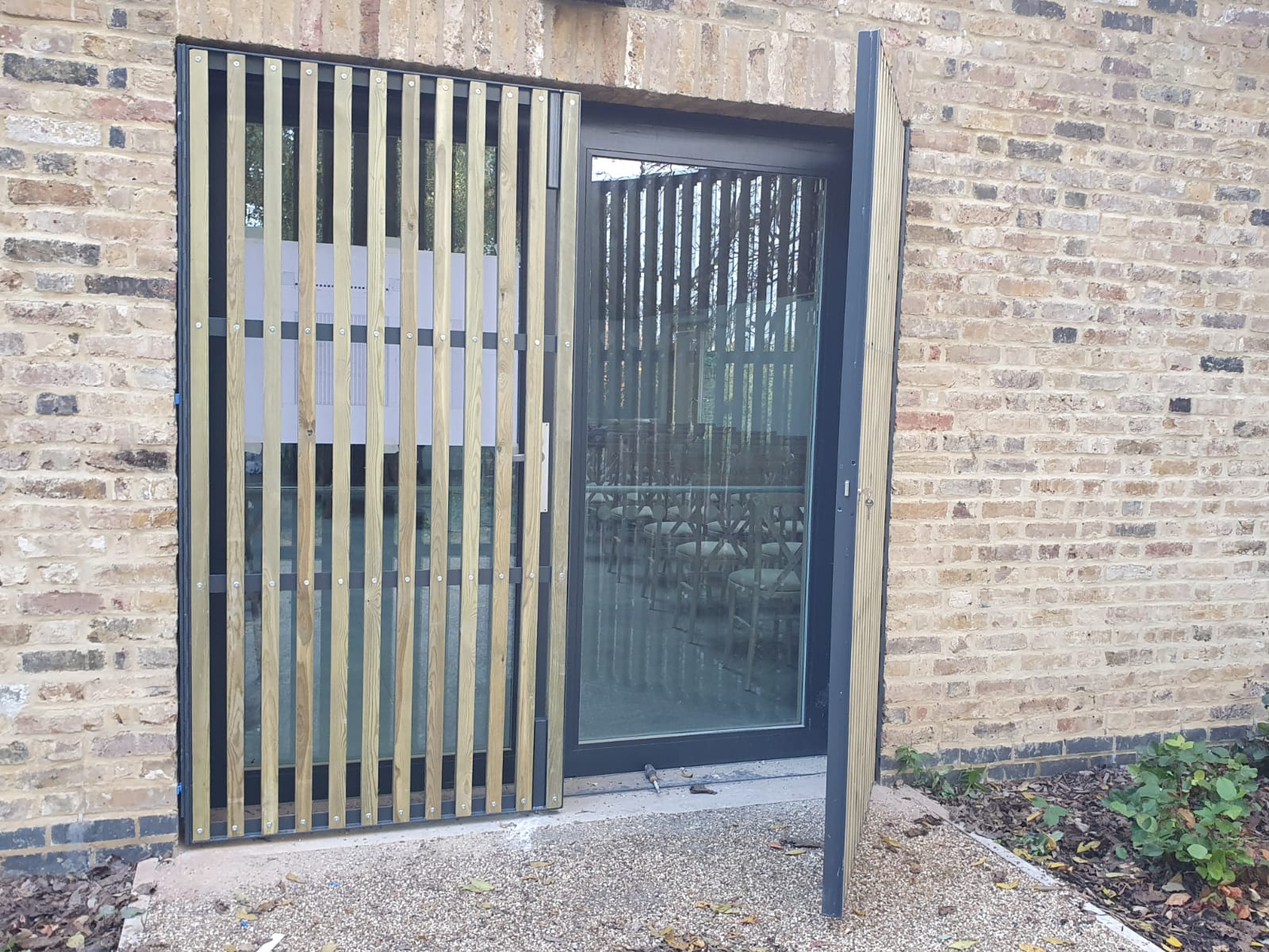 The glass house, Springfield park- Shutter