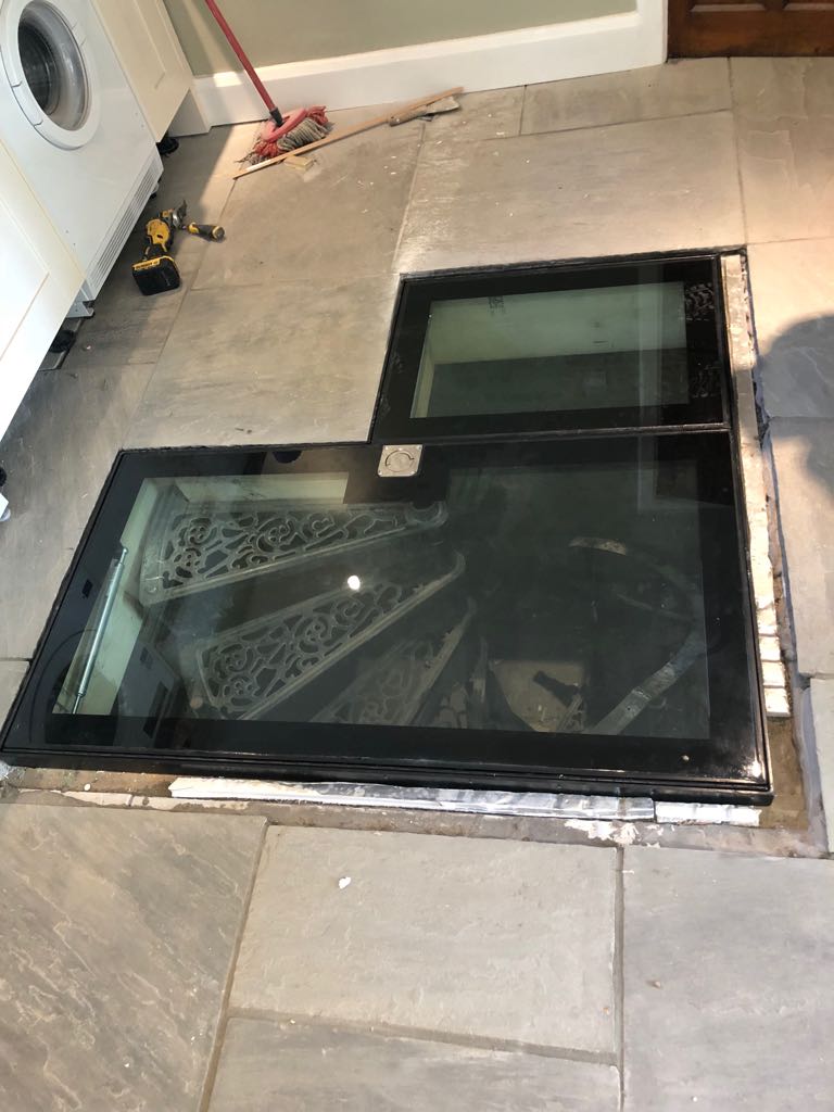 Trap door wine cellar – Putney