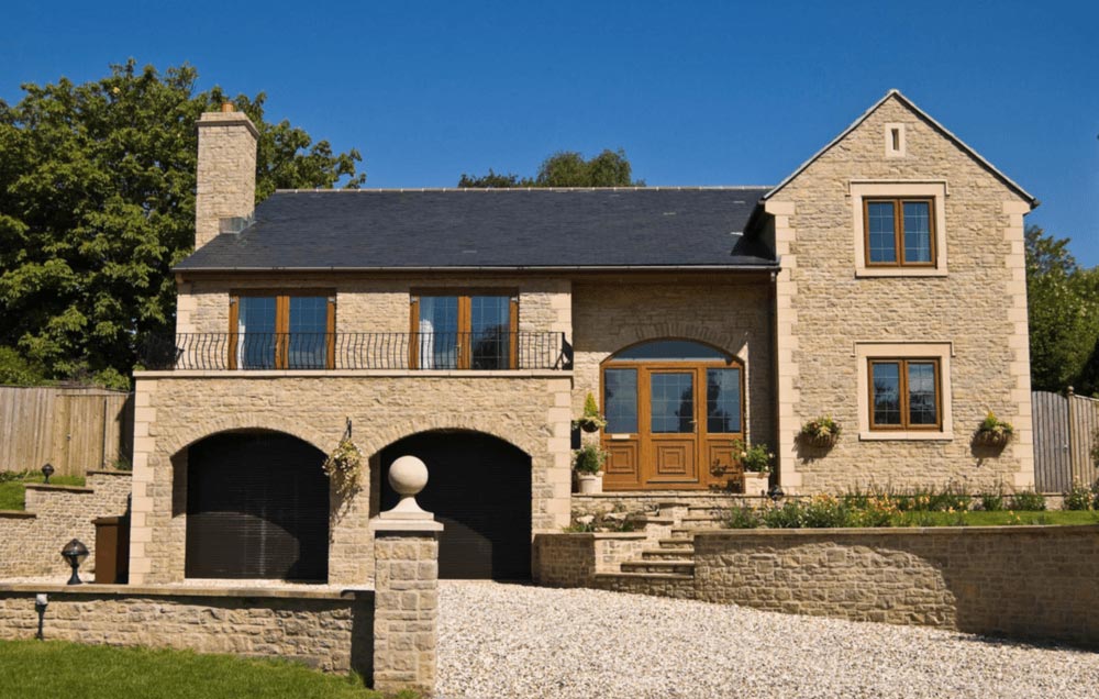 Sun Kissed House with a Gravel Driveway