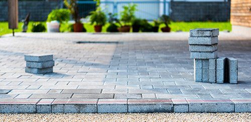Grey blocked paving driveway being installed