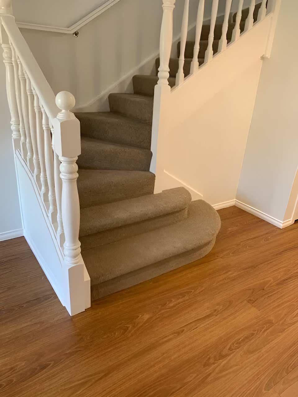 A Staircase With Carpeted Steps And Vinyl Flooring — Flooring Direct Mid North Coast in South Kempsey, NSW