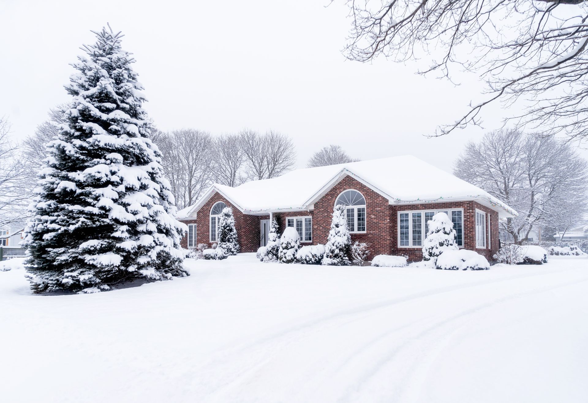 home in the winter snow