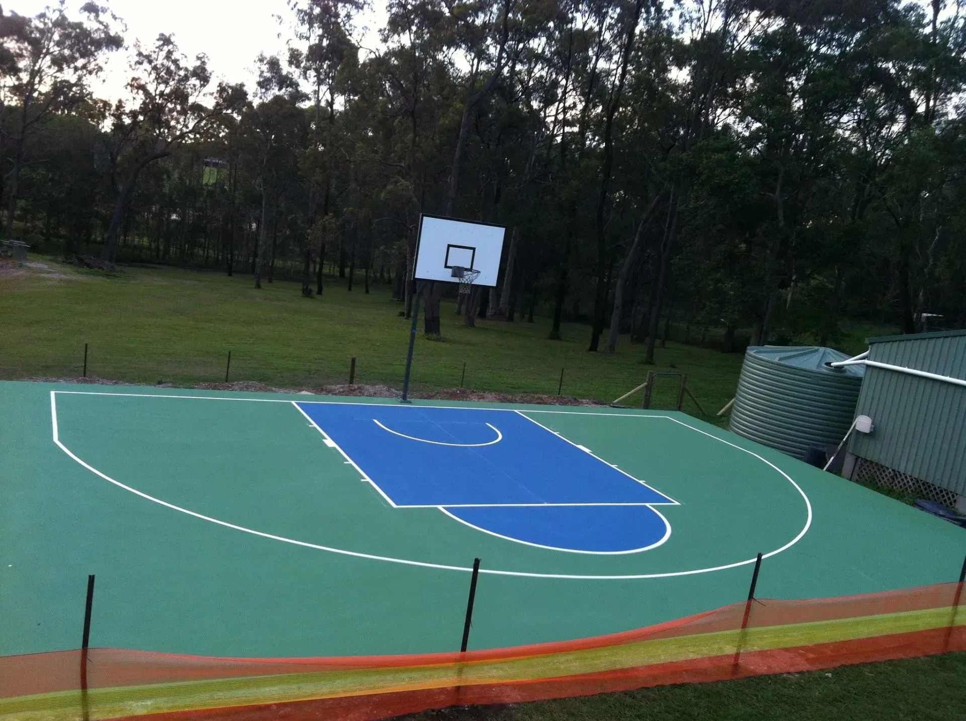 Blue and Green Basketball Court with a White Hoop — Queensland, Australia — Jordin Sports Constructions