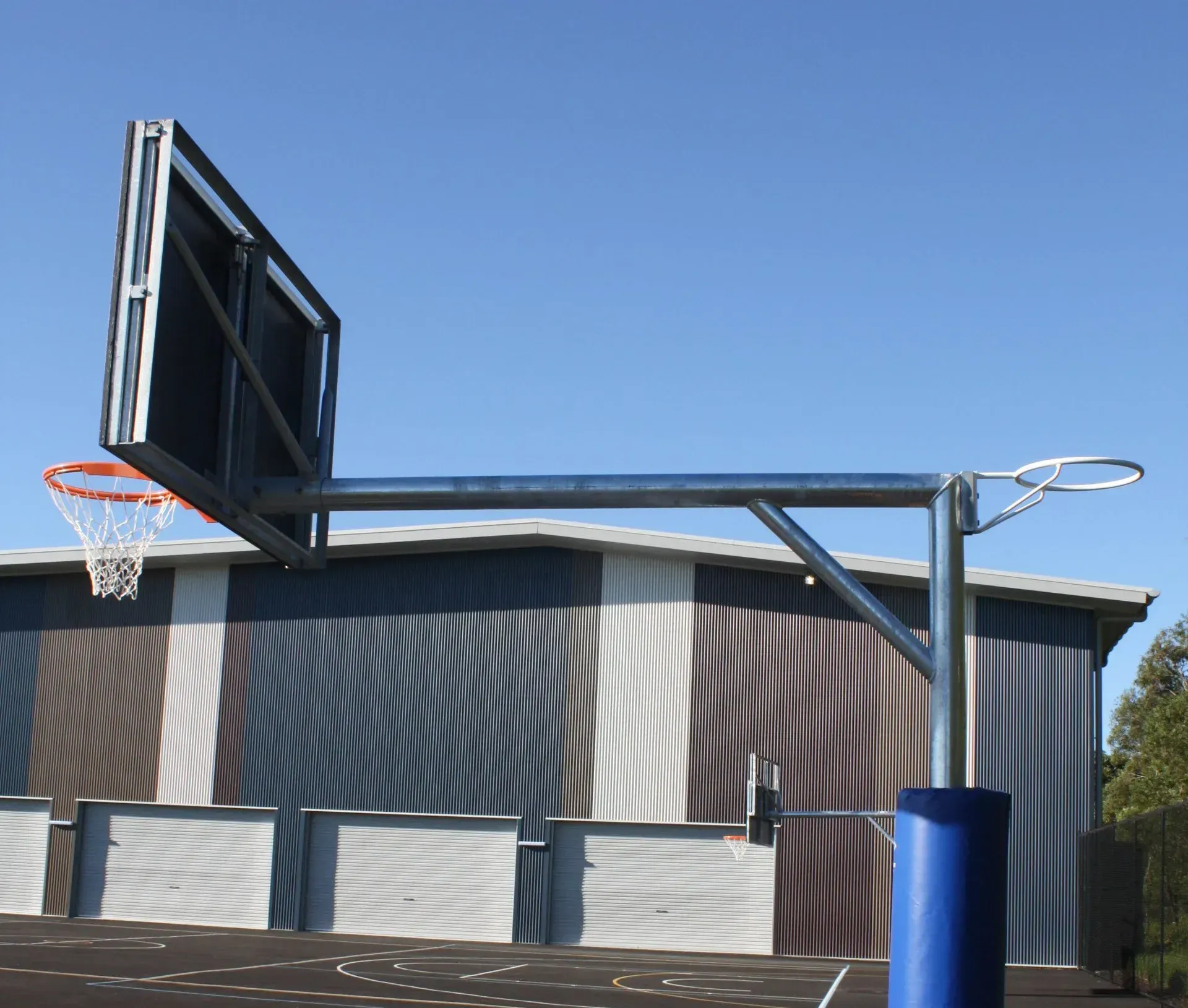 Basketball Hoop is in Front of a Building — Queensland, Australia — Jordin Sports Constructions