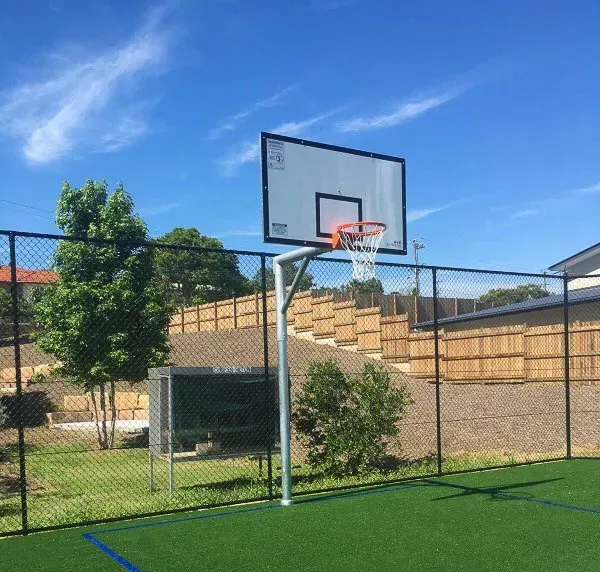 A Basketball Hoop on a Fence with a Blue Sky in the Background — Queensland, Australia — Jordin Sports Constructions