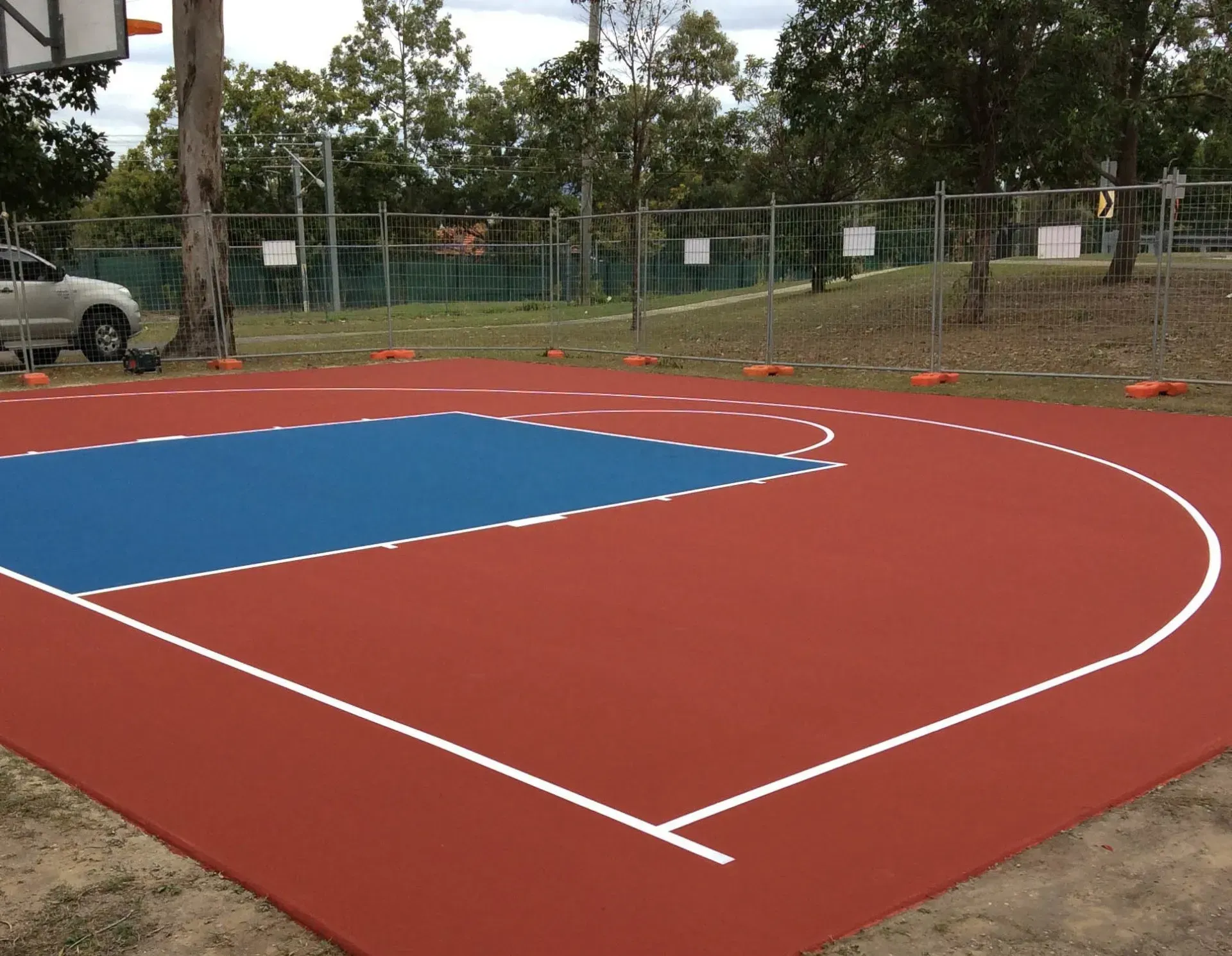 A Blue and Red Basketball Court with White Lines — Queensland, Australia — Jordin Sports Constructions