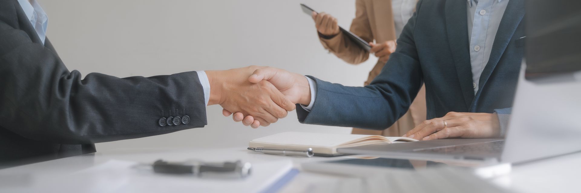 Employment concept, Employer recruiter hand shake with candidate with resume in job interview. 