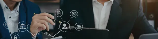 Business people in suits using a digital network interface on a laptop screen