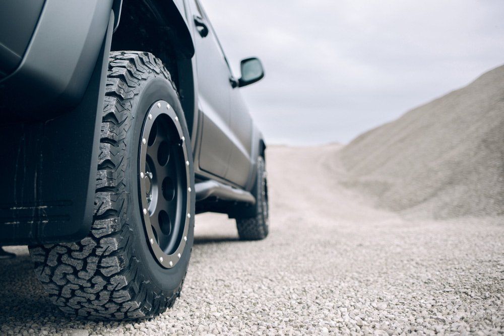 A Black Truck is Parked on a Gravel Road — SVS Auto Repairs & Dyno Tuning in Bungalow, QLD