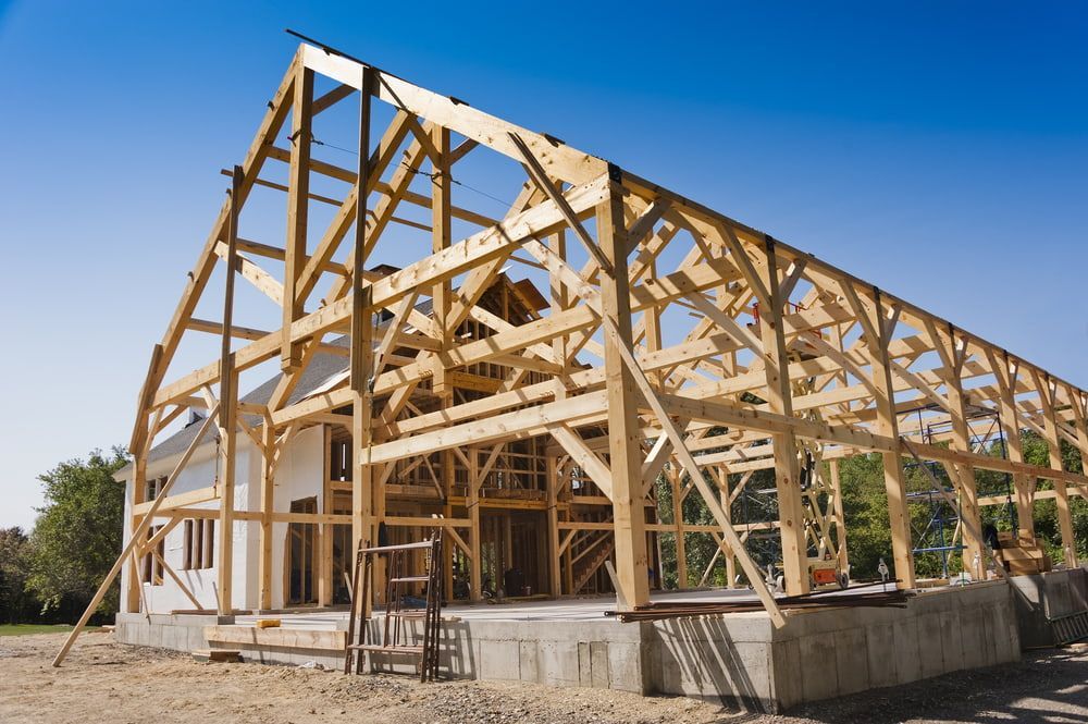A House Is Being Built With A Wooden Frame — Hitek Frame & Truss In Dubbo, NSW