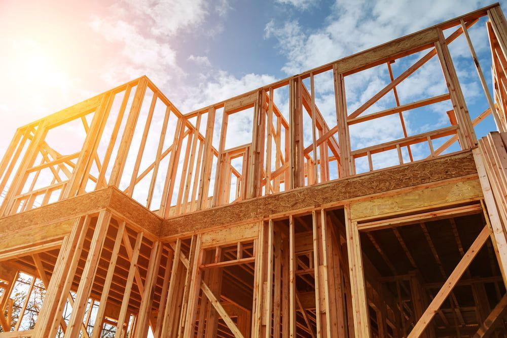 A House Is Being Built With A Wooden Frame — Hitek Frame & Truss In Mudgee, NSW
