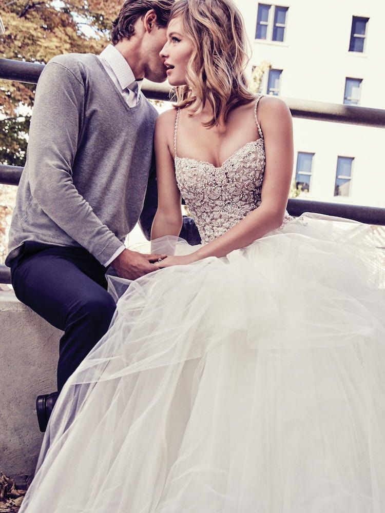 A Man is Kissing a Woman on the Cheek While She is Wearing a Wedding Dress — Just Formals in Winnellie, NT