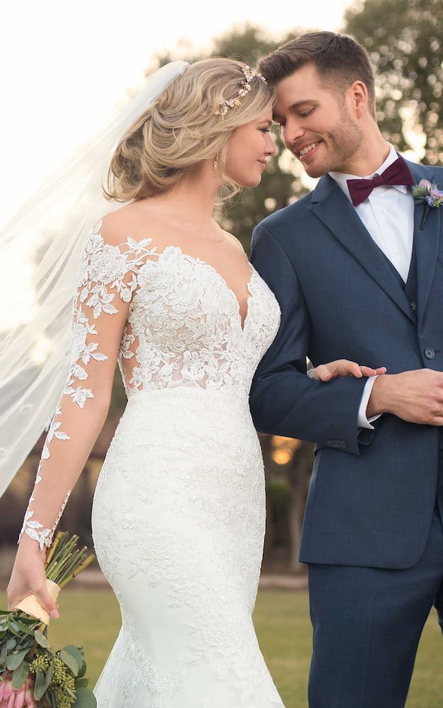 A Bride and Groom Are Standing Next to Each Other on a Lush Green Field — Just Formals in Winnellie, NT