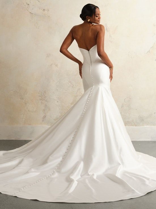 A Woman Stands Elegantly in a White Mermaid Wedding Dress — Just Formals in Winnellie, NT