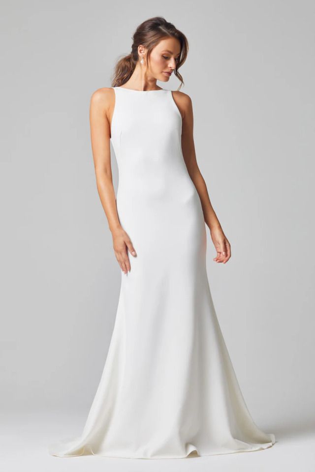 A Woman in an Elegant Floor-length White Gown — Just Formals in Winnellie, NT