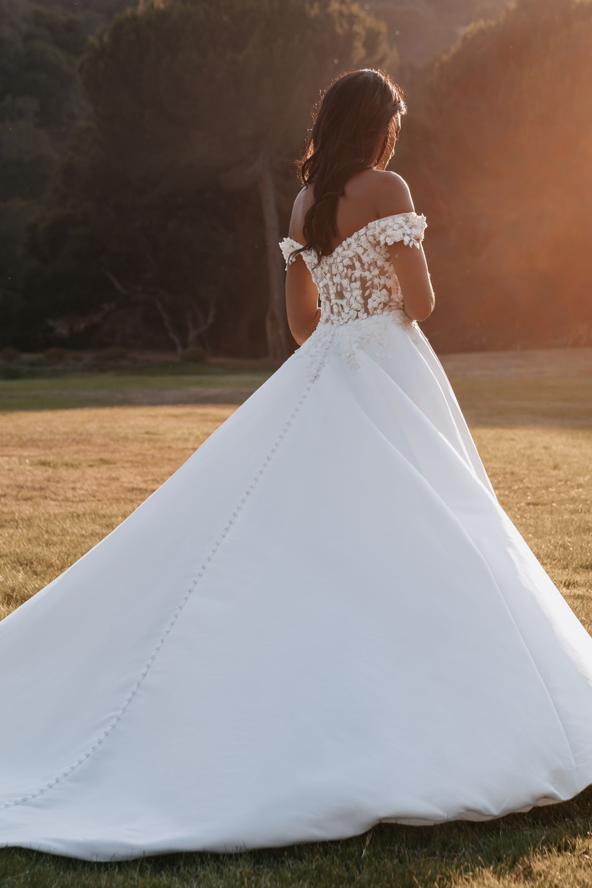 Bride in a White, Off-shoulder Dress With Floral Detailing — Just Formals in Winnellie, NT