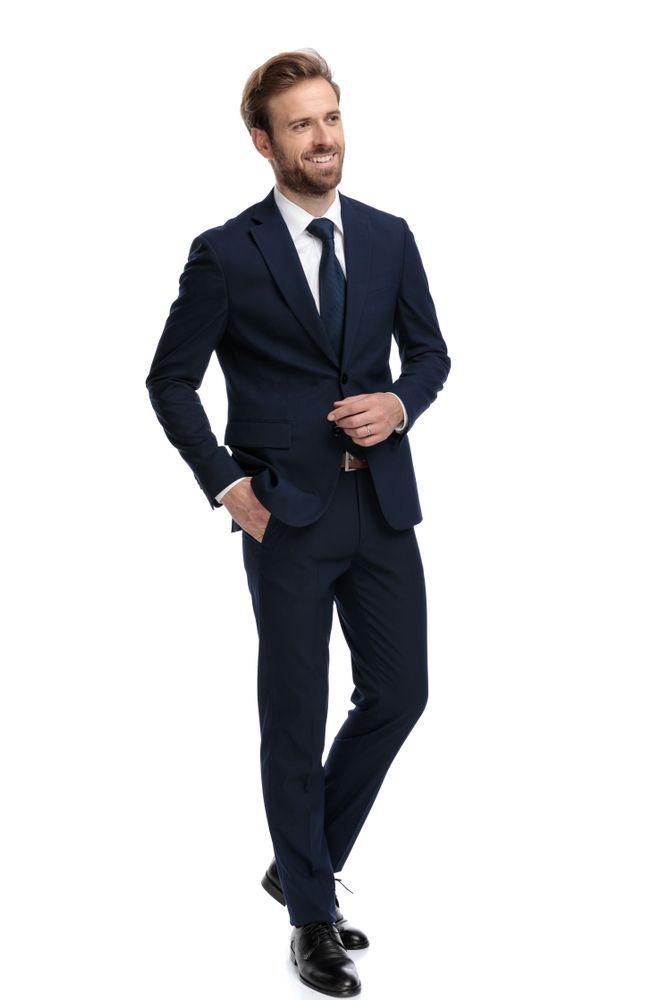 Man in a Dark Blue Suit Smiles, Looks to the Side — Just Formals in Winnellie, NT