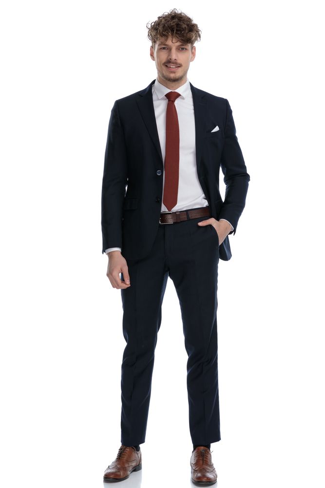 Man in a Navy Suit With a Red Tie, Hand in Pocket — Just Formals in Winnellie, NT