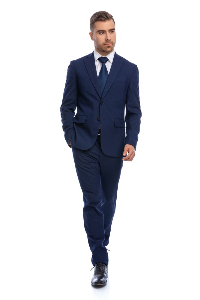 Man in Navy Blue Suit Walks Forward, Looking to the Side — Just Formals in Winnellie, NT