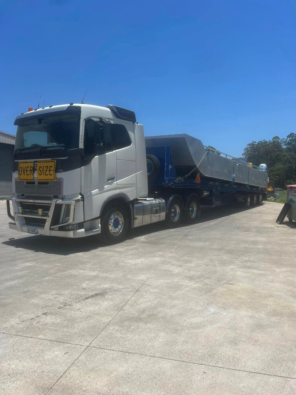 A Large Semi Truck is Parked in a Parking Lot — Port Macquarie Tilt Tray Towing in Port Macquarie, NSW