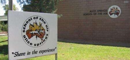 A sign for the school of the arts in alice springs