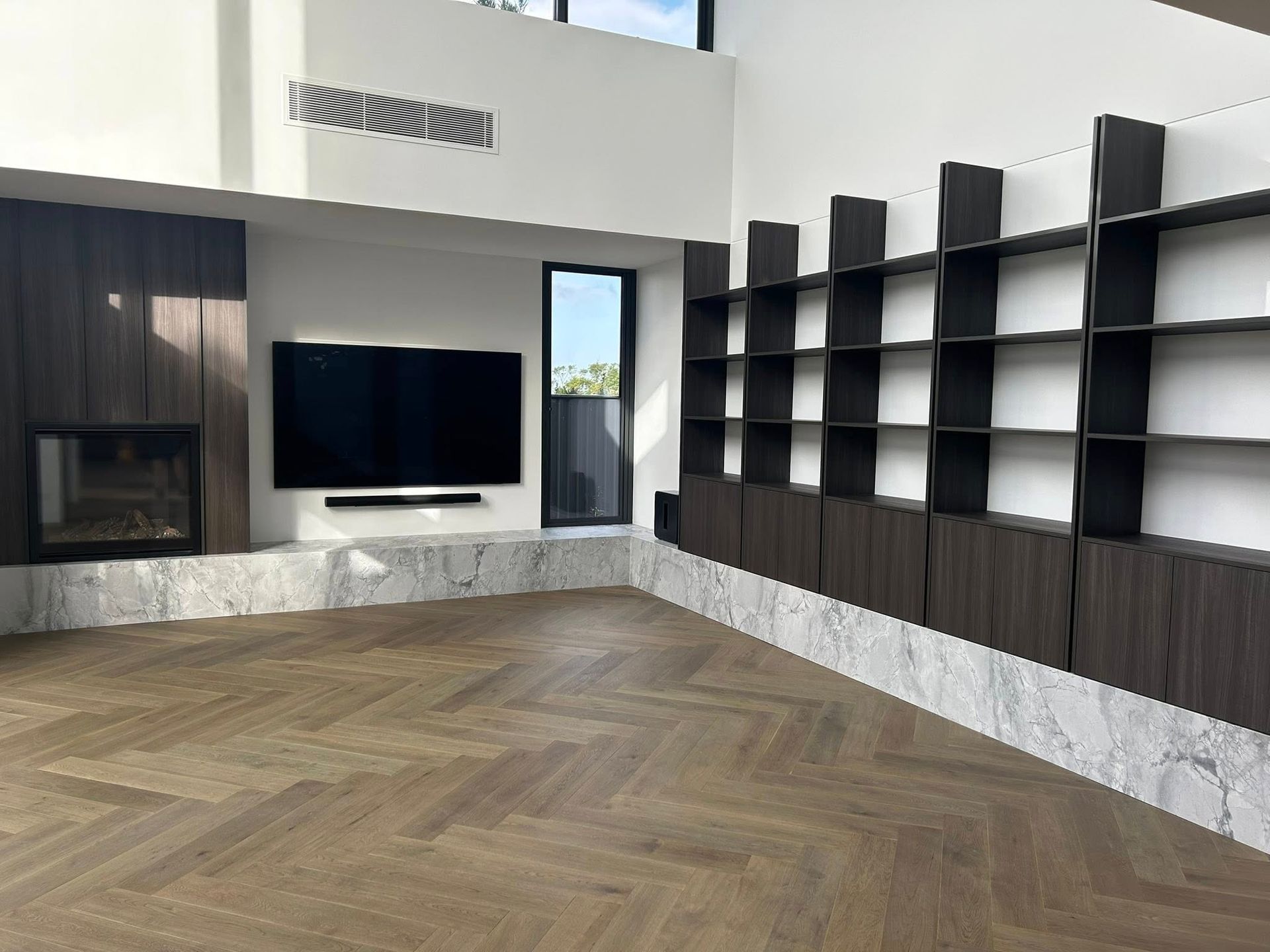 A Room with A Chair, Sink, Mirror and Shelves Filled with Cosmetics — Inovative Interiors In Cardiff, NSW