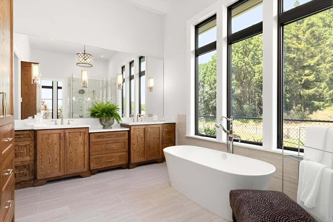 A Bathroom with Two Sinks, a Tub, and A Lot of Windows — Inovative Interiors In Cardiff, NSW