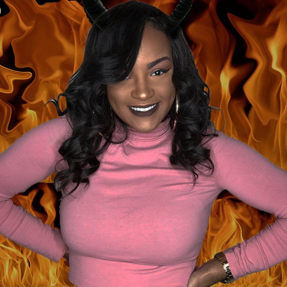 Image of a woman with a fire background